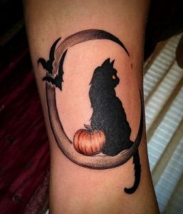 Black cat and moon tattoo